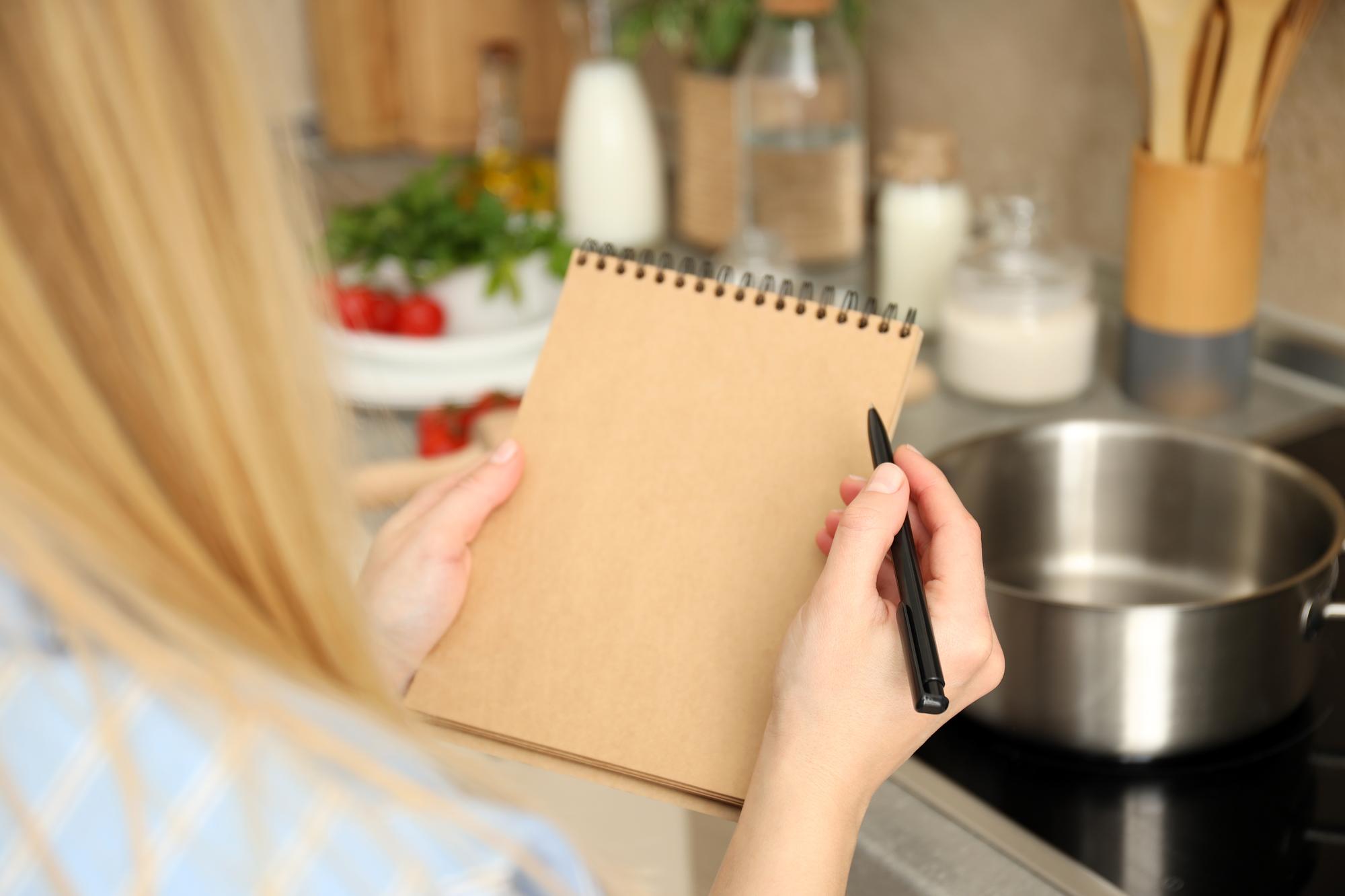 Notebook with process notes and checklist